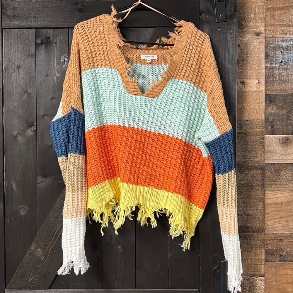 Distressed sweater